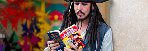 Pirate reading "Under the Black Ensign"