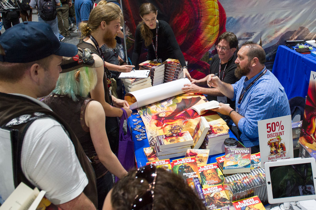 Andrew and Jake signing books for fans at SDCC.