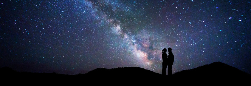 Couple against the stars