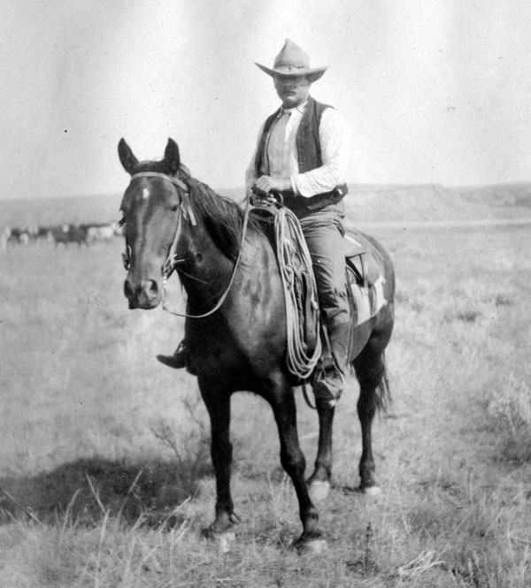 cowboy on a horse, circa 1910