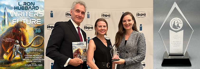 John Goodwin, Andrea Fleck-Nisbet, CEO IBPA, Emily Goodwin with award