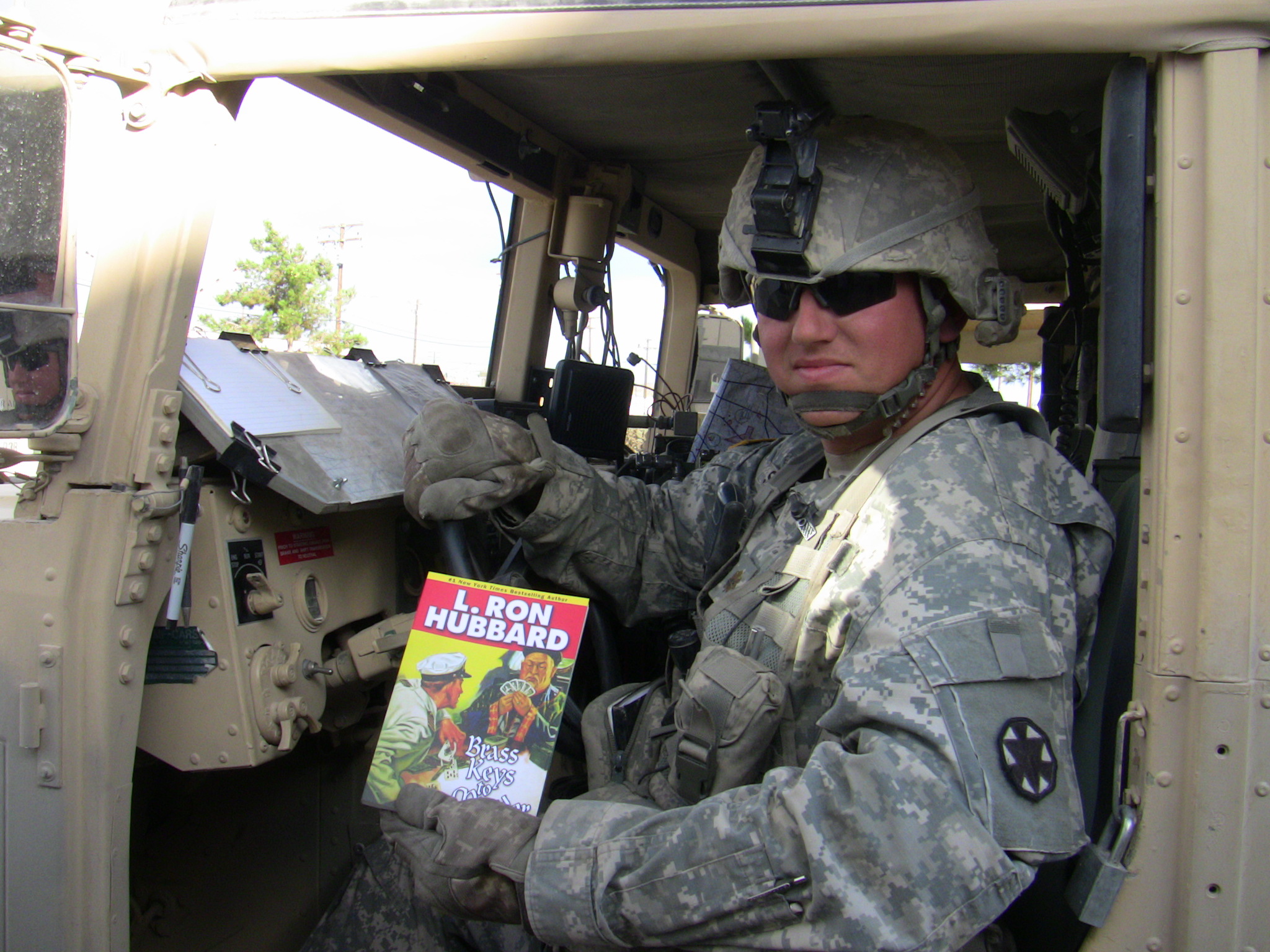 Soldier Reading Brass Keys to Murder