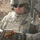 Soldier Reading Branded Outlaw
