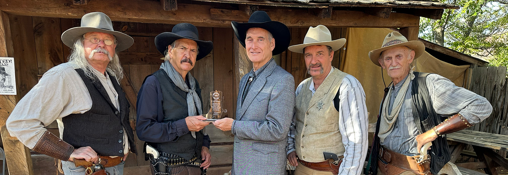 Presentation by Buck Montgomery to John Goodwin at the Wild West Fest in Little Hollywood, Kanab, Utah, in celebration of the 90th anniversary of L. Ron Hubbard as a Western writer.
